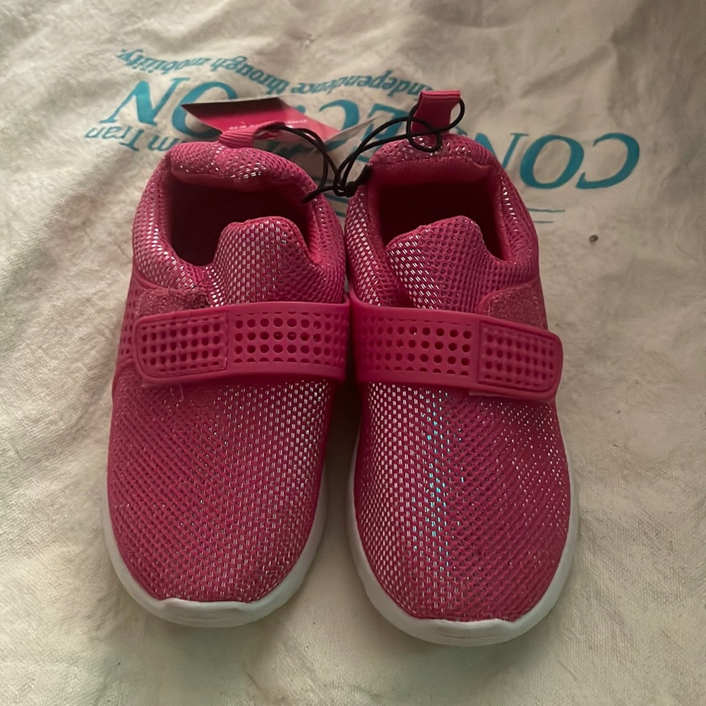 Pink and sliver run or play shoes